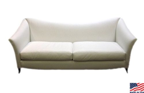 white sofa with curved back and arms great for weddings and more