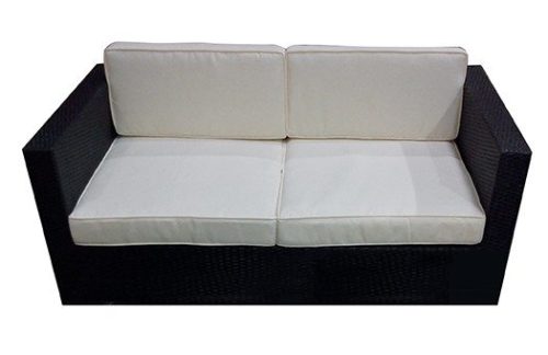 Rattan sofa with white cushions great for outdoor and themed events