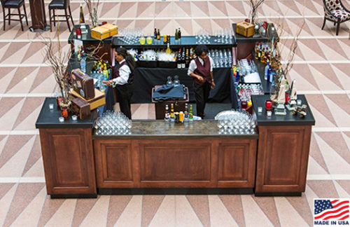 8 foot Mahogany bar fronts with ebony countertop and mahogany pedestals in a square configuration great for special events