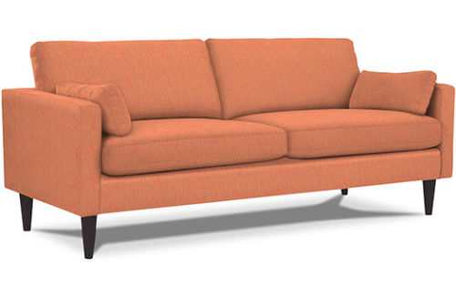 Mid century orange sofa great for corporate events and more