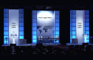 Branded Backdrop with a set of 6 2x2 Lit Window Columns; custom backdrop with lit window columns for corporate events.