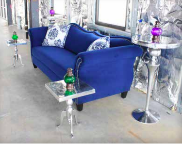 royal blue couch with blue and white accent pillows