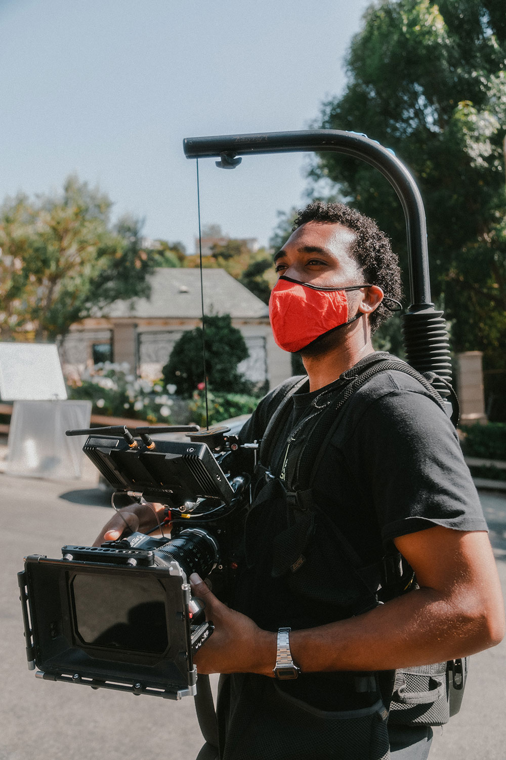 Man In mask With Video Equipment