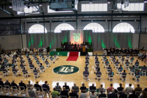 graduations stage deck school logo gobo gray drape uplighting sheer IMG 1159 1500px